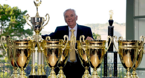 Chuck Hughes Wtih Trophies Pic.jpeg