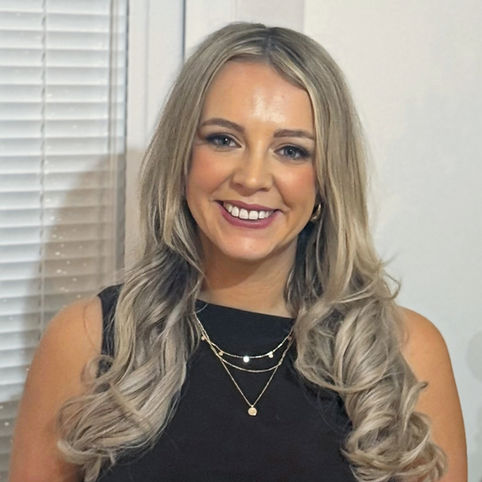 Headshot photograph of Ruth