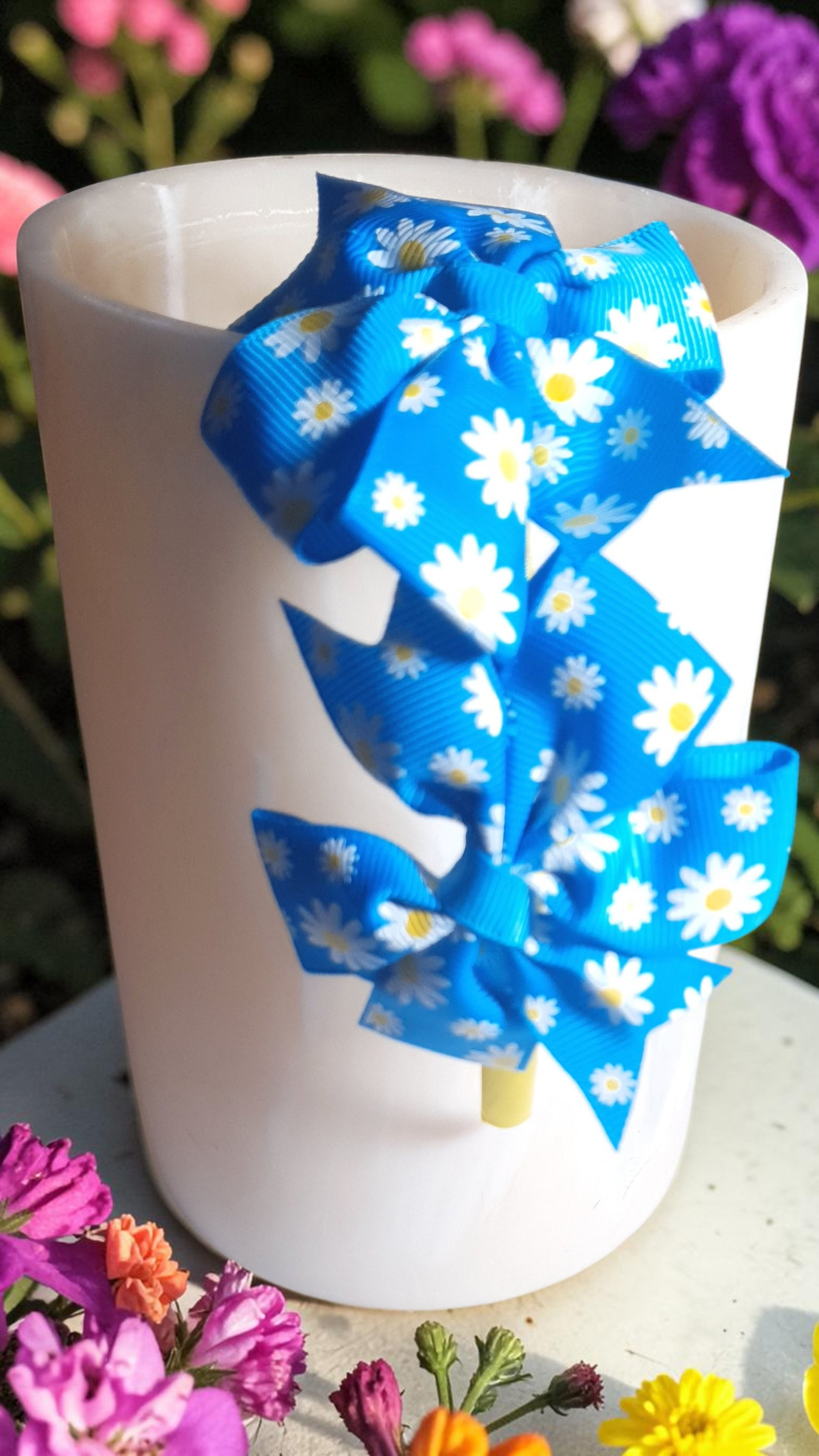 Headband features two beautifully layered boutique-style bows
