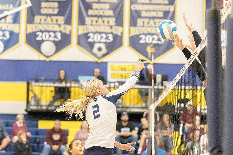 Ellie Clayberg at the net for the Titans against Harrisburg
