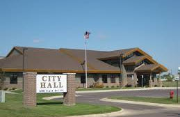 City swears in three councilors, awards bid for law enforcement center