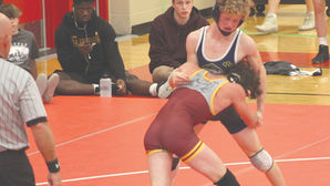 Titan wrestlers set records at Dakota XII Conference Meet
