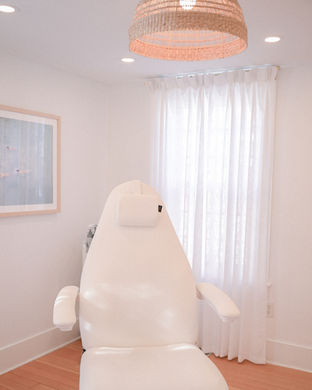 White treatment chair in bright room