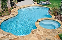Inground pool with stone surround