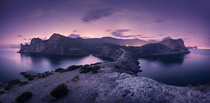 Beautiful night landscape with mountains, sea and starry skyAdobeStock_98208417.jpeg