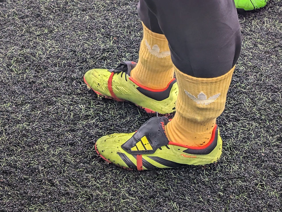 Walking footballer in boots