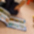 Child Browsing Trading Cards