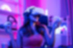 Asian young Esport woman gamer use technology VR glasses and play game. Attractive beautif