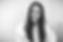 A black and white headshot photo of Israa Taher.