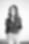 A black and white headshot photo of Raelene Denae.