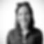A black and white headshot photo of Erica Kelm.
