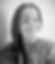 A black and white headshot photo of Rachel Reichert.