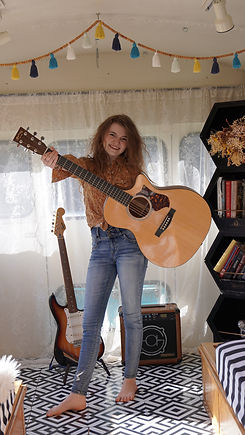 Esther Standing with Guitar.jpg
