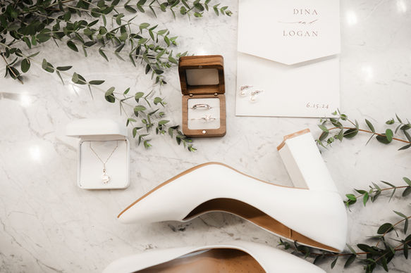 Close-up detail shot of bridal heels and wedding rings captured by top wedding photographer in The Woodlands, Cypress, and Conroe