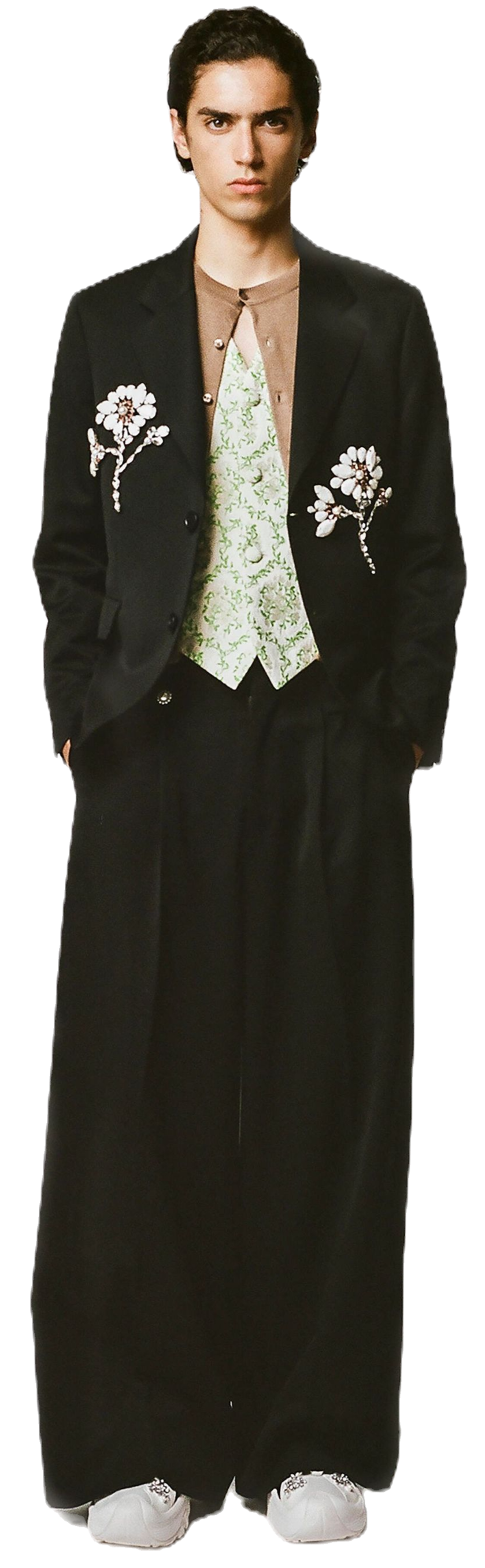 Bordado botânico discreto em terno de alfaiataria. Uma ideia perfeita para personalizar blazers ou camisas de linho com pequenos pontos à mão. Simone Rocha