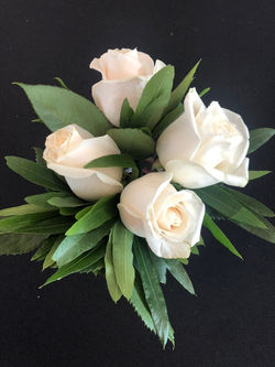 White Rose Boutonnieres.jpeg