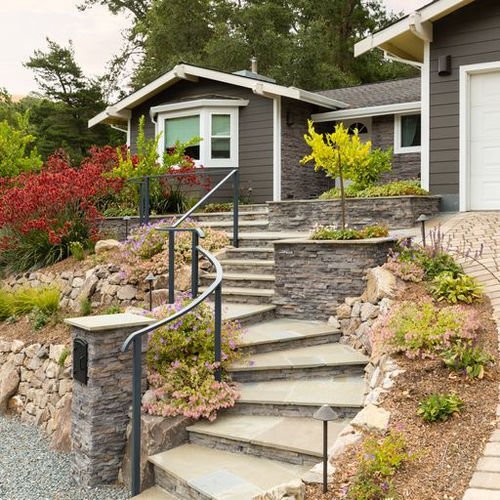 Full range bluestone staircase curving through a Walnut Creek front yard