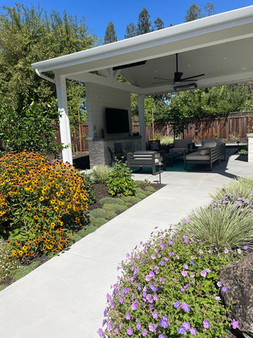 Horizontal outdoor fireplace built into a modern seating area in Danville