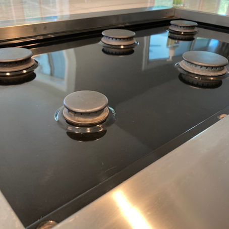 Cleaning your Kitchen Stovetop from grease and grime!