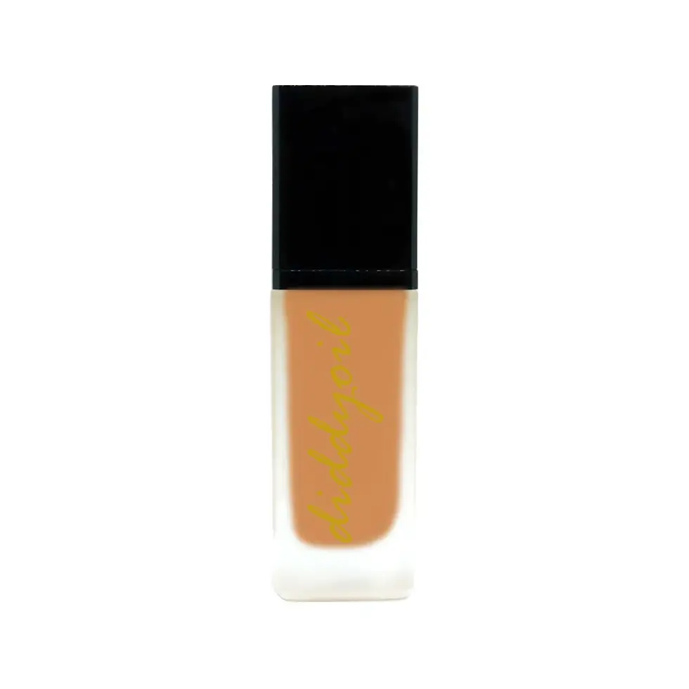 Bottle of light brown liquid foundation diddyoil