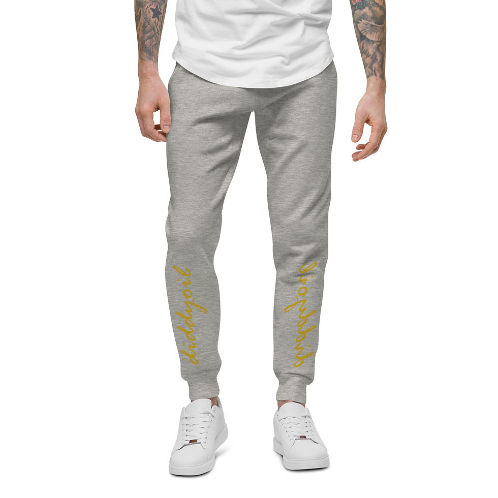 Thumbnail: Model in gray unisex slimfit fleece sweatpants with gold diddyoil