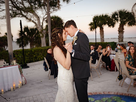 Bride and groom sharing an emotional first dance at an outdoor wedding, showing what makes a good wedding photographer: timing, connection, and genuine moments.