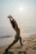 Yoga practice on beautiful Tan Thanh Beach in Hoi An, Vietnam, led by Phuoc Nguyen during Naia's 200-hour teacher training.