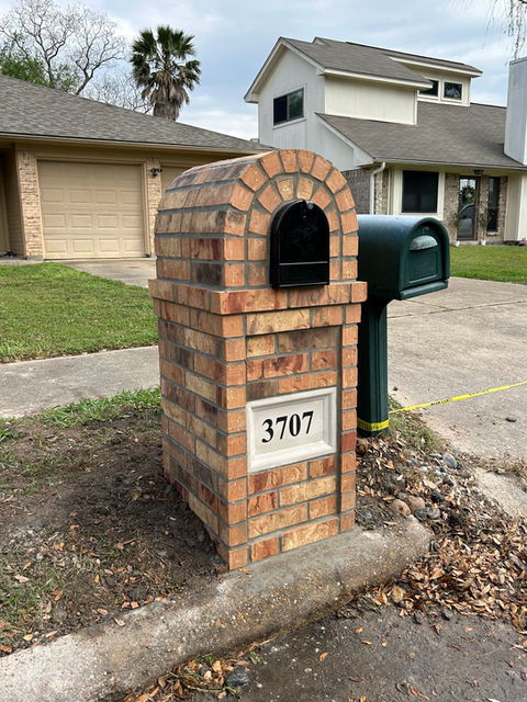 custom brick mailbox installation with address block built in the deer park area