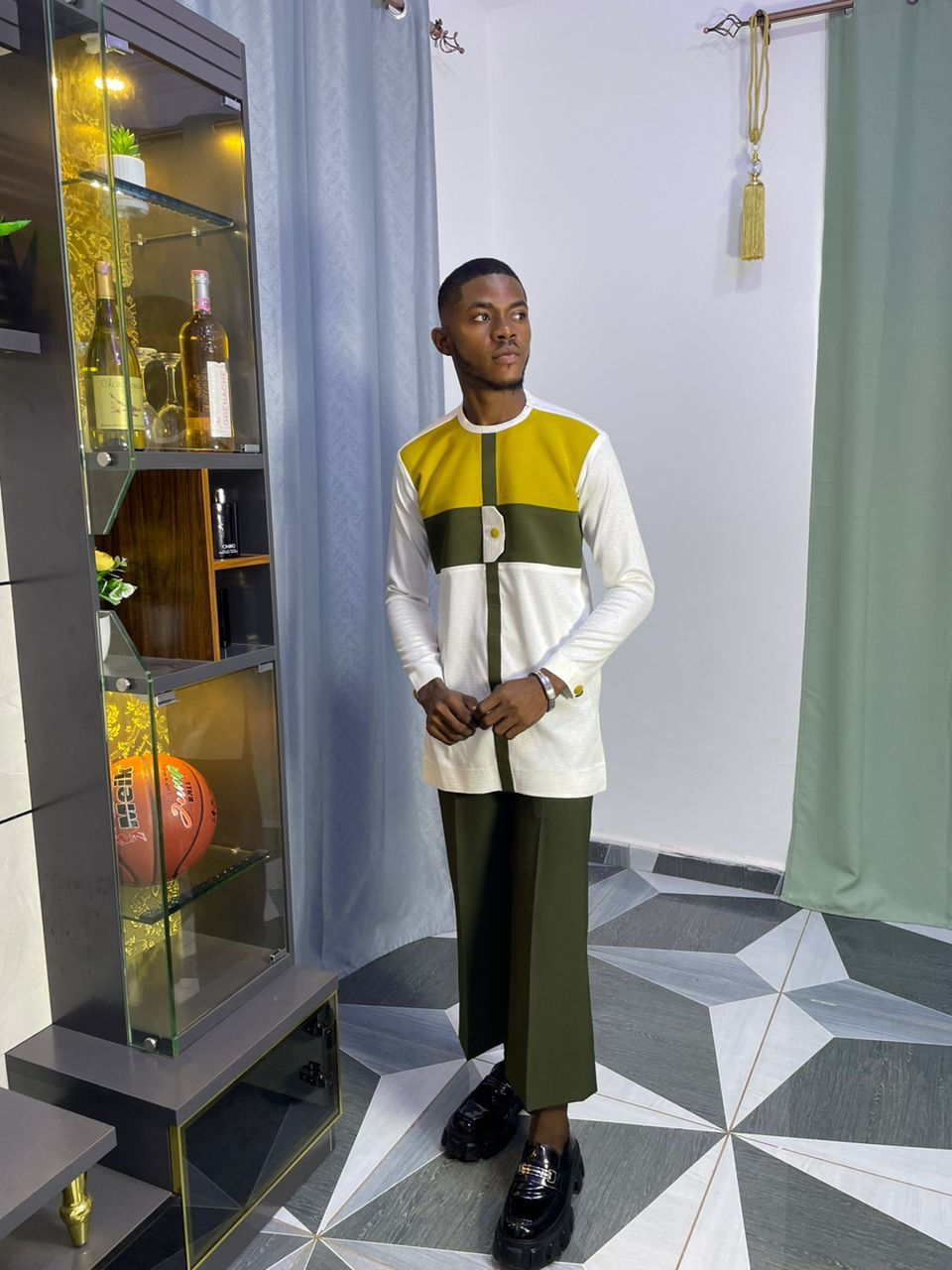 A man wearing African print shirt