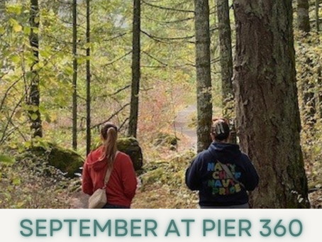 Two peers walking through a forrest.