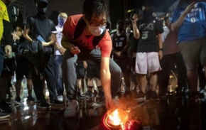 Hong Kong Protesters Trample, Burn Jersey of NBA star LeBron James"We just can't accept that."