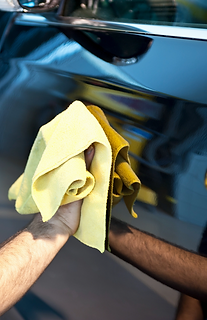 High-gloss car finish after premium auto detailing at Stardust Auto Spa