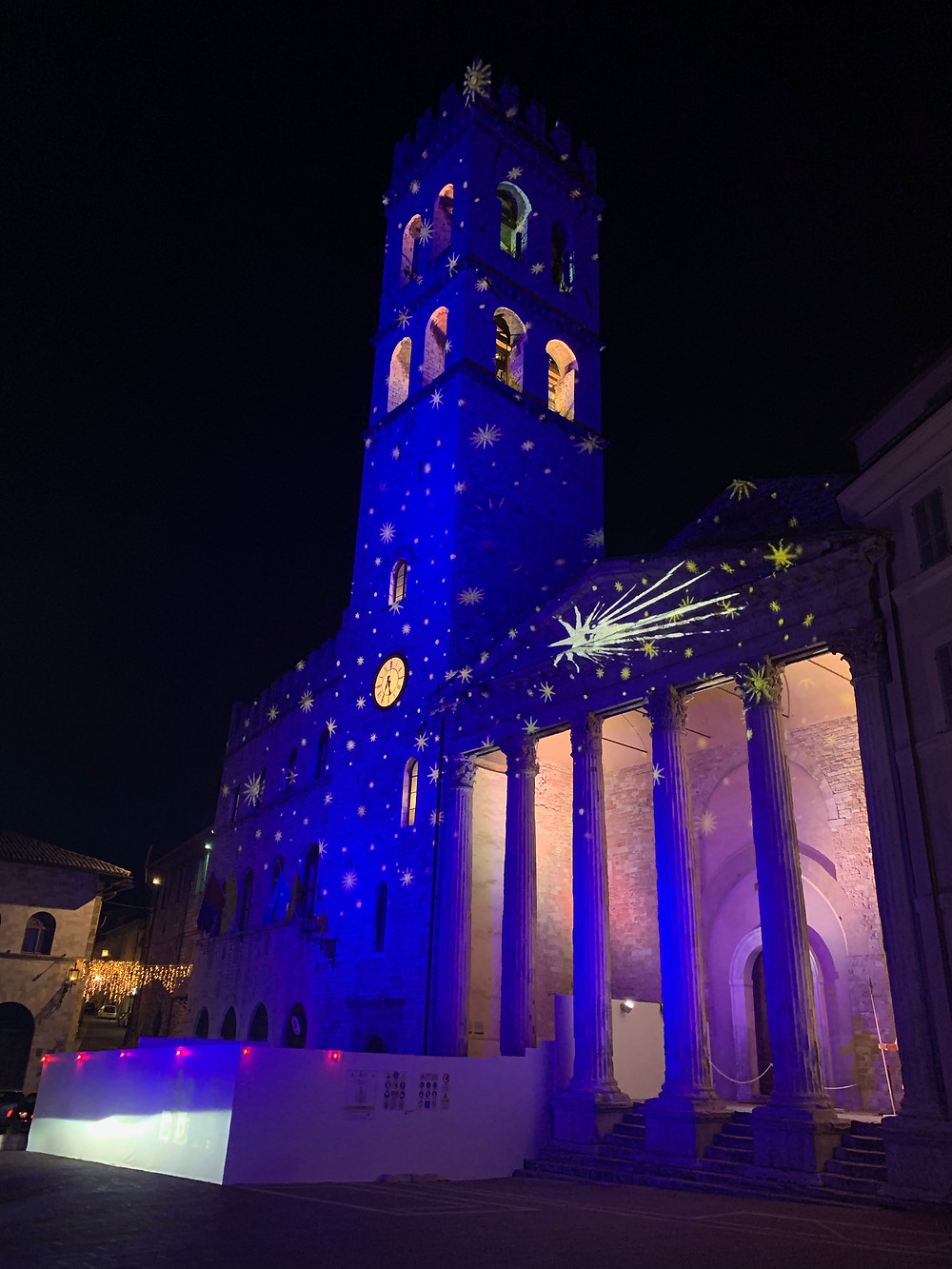 A Building LIghted By Projectors On The Main Square In Assisi, Italy