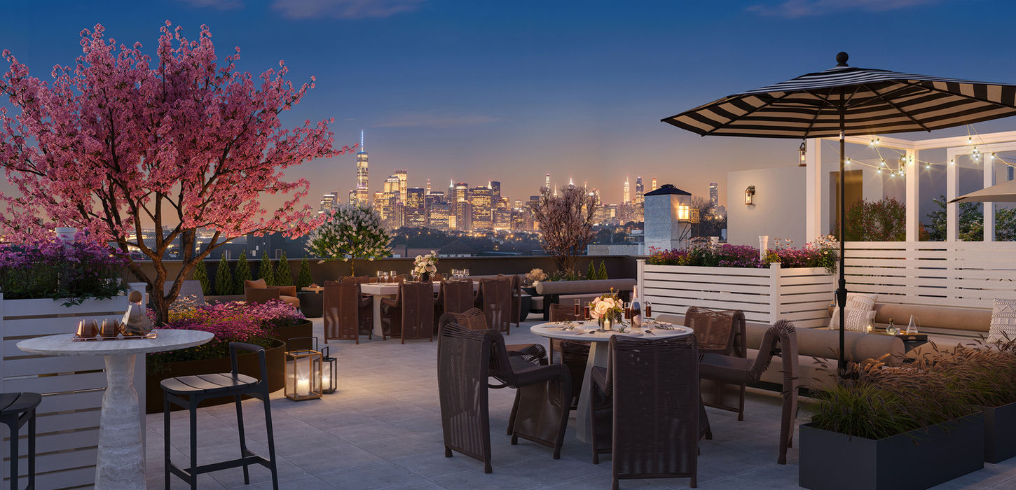 Vista Skydeck at night with Manhattan skyline in background.