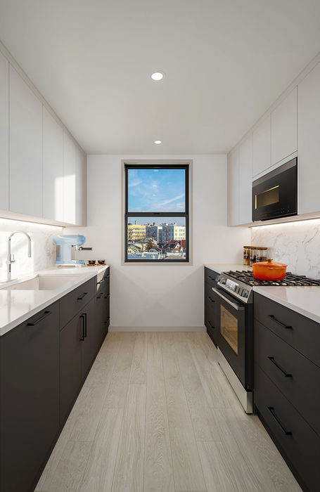 Galley kitchen with window.