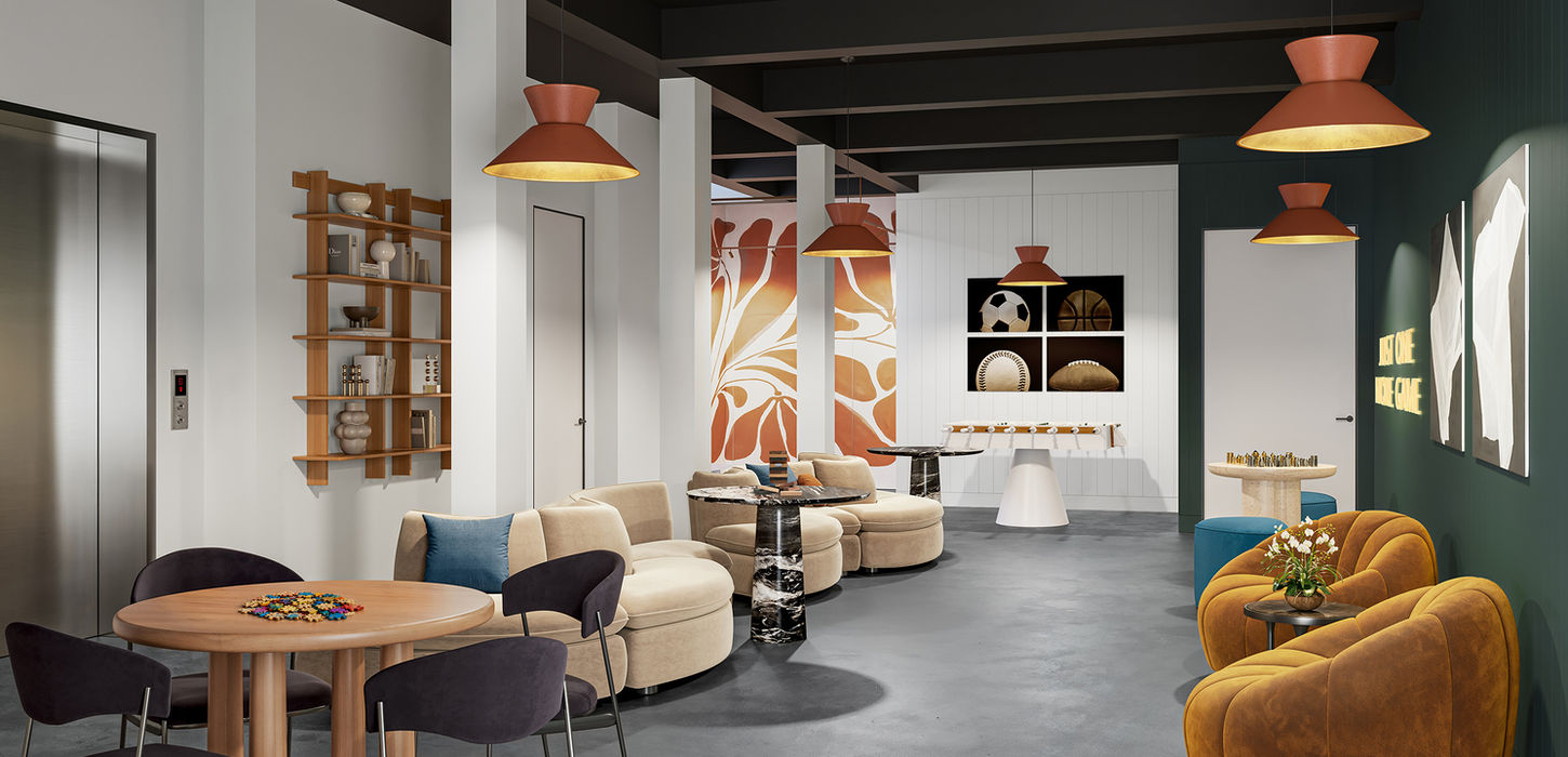 Residents Lounge with soft seating, tables and chairs for games and foosball table.
