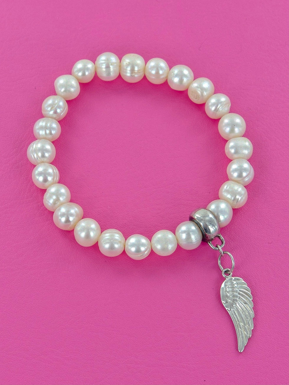 Thumbnail: Cultured white pearl with sterling silver angel wing charm bracelet
