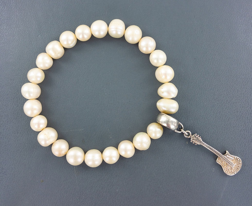 Thumbnail: Cultured white pearl with sterling silver angel wing charm bracelet