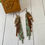 Thumbnail: Muted Floral, Brown and Teal Leather Fringe Earrings