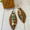 Thumbnail: Brown and Speckled Leather Fringe Earrings