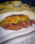 Grilled wagyu ribeye topped with green sambal and crispy garlic chips