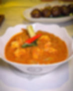 Jackfruit curry in turmeric coconut gravy with prawns and chunks of salted fish