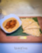 Lacy pandan crepes with warm banana compote in coconut milk and gula melaka