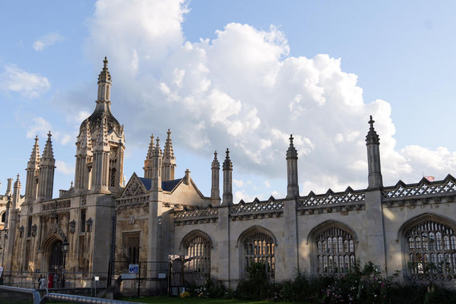 King’s College Chapel in Cambridge with dramatic clouds in the sky above.