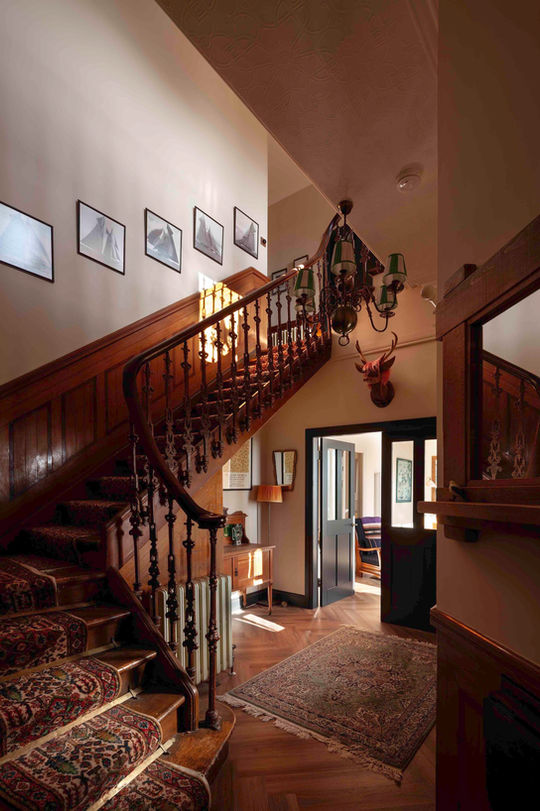 Large entrance hallway with stairs leading to the first floor at Bonnie Blink, Dunoon.