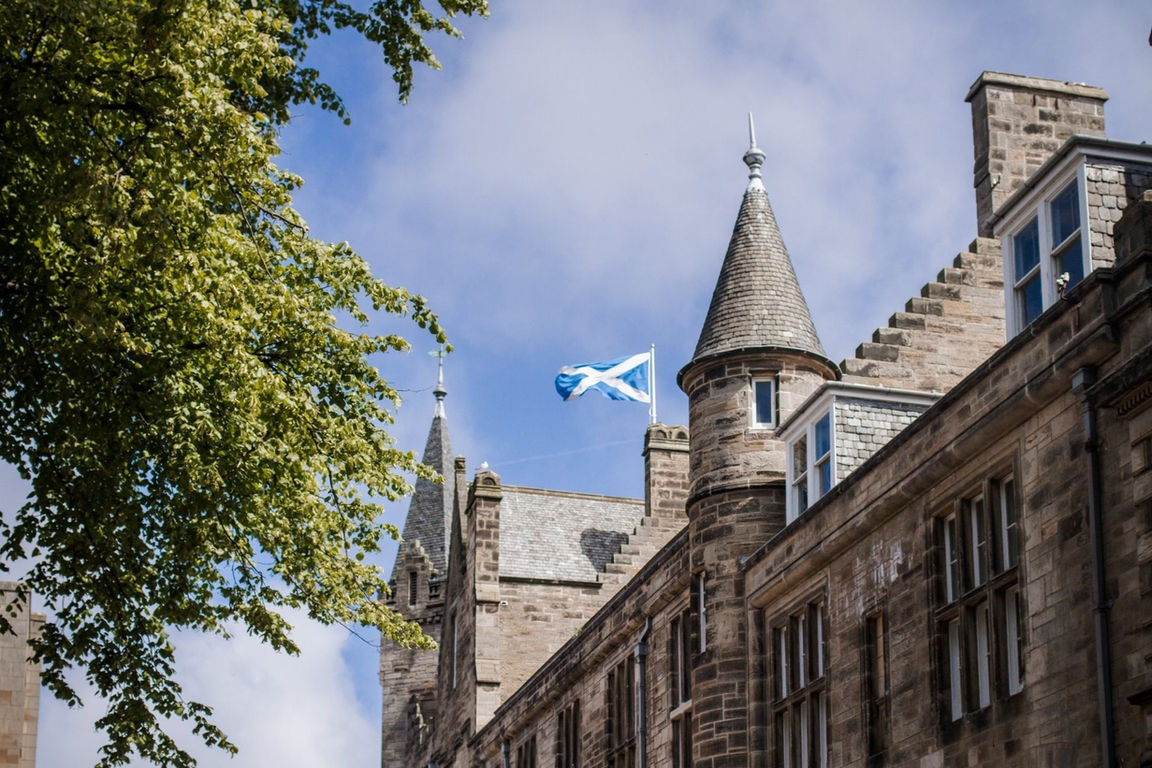 University of St Andrews building with Scottish flag flying.