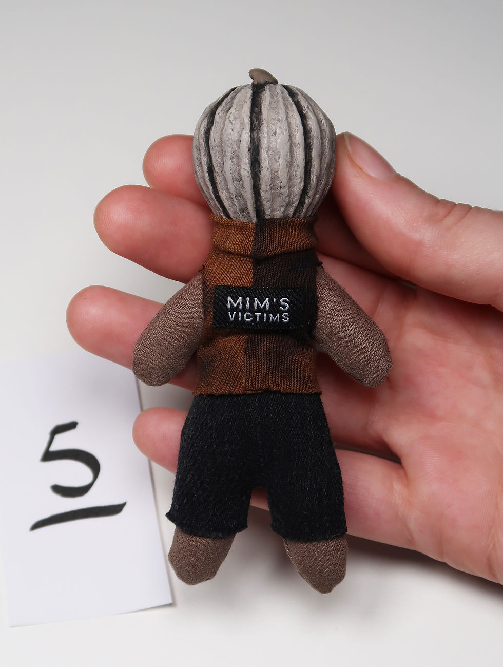 Thumbnail: 4" textured mini pumpkin doll