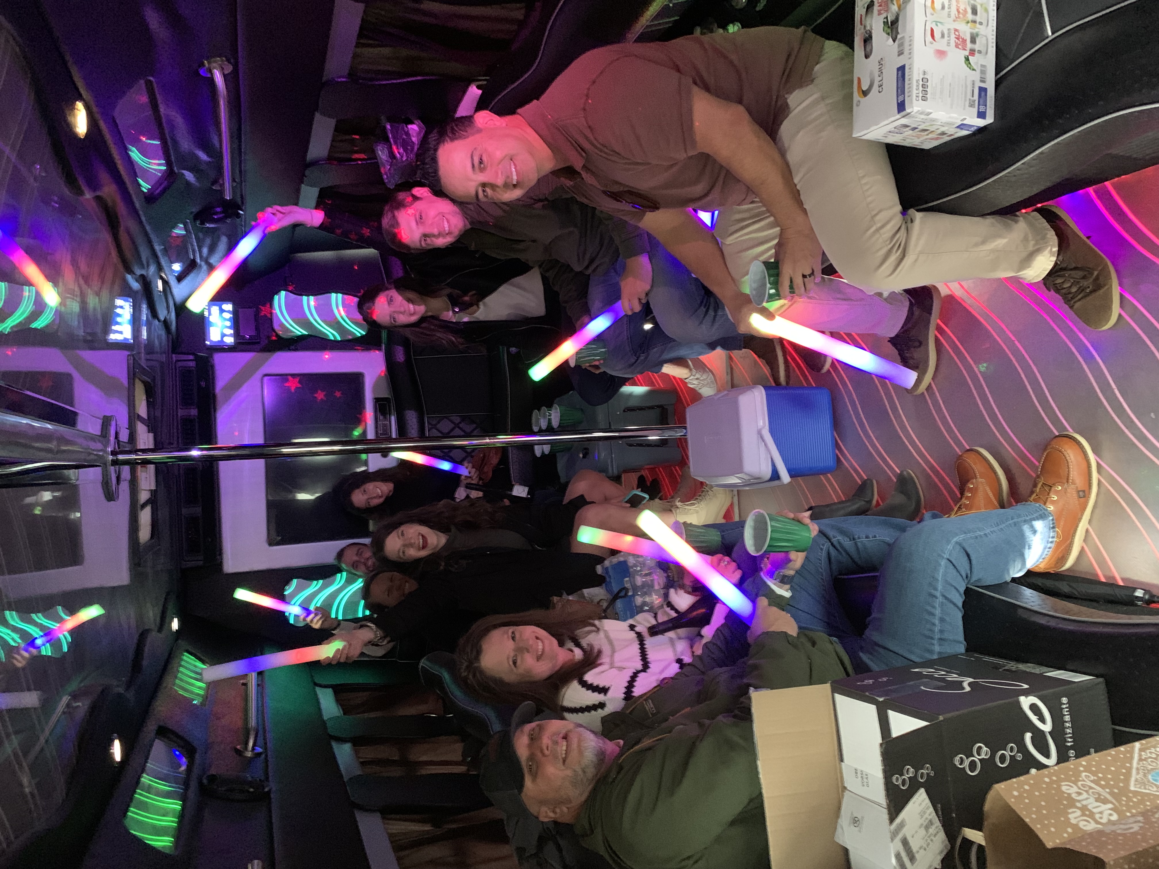 People Having Fun Inside a CharlotteLUX Party Bus