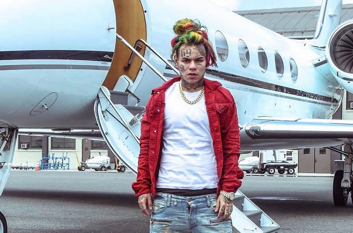 Tekashi 6ix9ine received a three-month prison sentence for probation violations and is expected to serve in protective custody starting January 6, 2026.