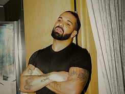 Drake surprised fans by releasing three albums at once, featuring 43 tracks and major collaborations.